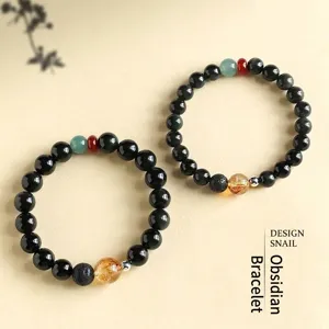 Handmade black obsidian couple bracelets with yellow crystal and green agate accents