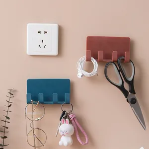Multi-functional wall-mounted storage hooks for bathroom and kitchen organization.