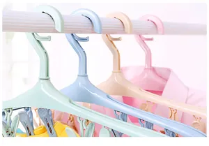 Detailed view of pastel windproof multi-clip hangers for drying socks and underwear