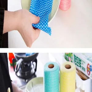 Detailed view of disposable blue wave-pattern non-woven cleaning cloth for dishwashing