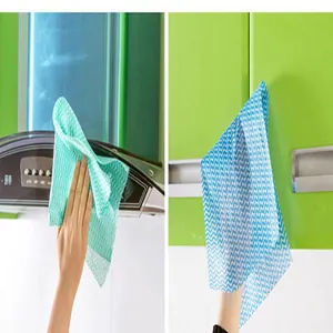 Detailed view of disposable wavy pattern dishcloth used for cleaning kitchen surfaces.