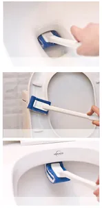 Detailed view of disposable toilet brush cleaning hard-to-reach areas of the toilet