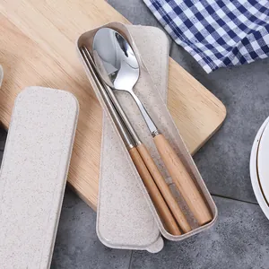 Portable stainless steel spoon and chopsticks set with wooden handles and storage box
