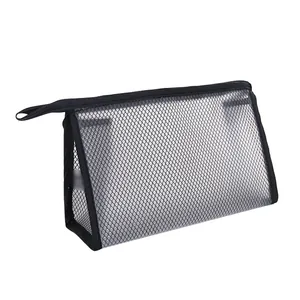 Minimalist black mesh travel toiletry bag with zipper and portable handle organizer.