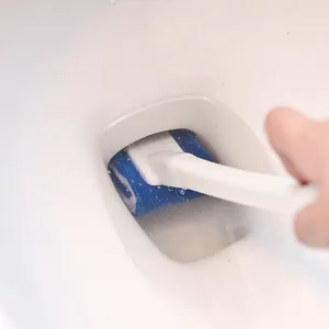 Disposable toilet brush with replaceable blue sponge head cleaning a white bathroom bowl