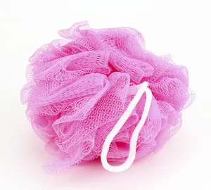 Detailed close-up of a vibrant pink nylon mesh bath loofah sponge with white hanging rope.