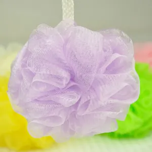 Detail shot of a soft purple nylon bath sponge with fine mesh for gentle exfoliation