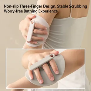 Ergonomic silicone bath scrubber with three-finger handle for effective body exfoliating.