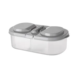 Grey double-compartment plastic food storage container with airtight lids for kitchen organization