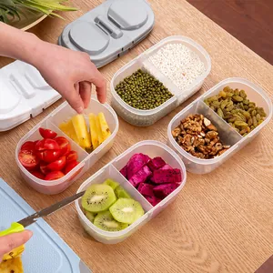 Set of four double-compartment airtight food storage containers for kitchen pantry organization
