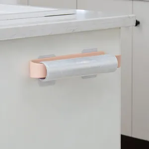 Multifunctional pink adhesive wall-mounted rack for plastic wrap or kitchen towels