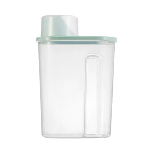 Large airtight kitchen cereal storage jar with measuring cup cap in mint green lid