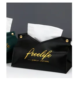 Macro view of black PU leather tissue box featuring elegant gold Freelife lettering design
