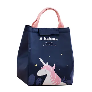 Insulated navy blue lunch bag with unicorn print and pink handle