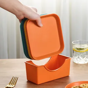 Set of colorful square plastic snack plates with orange storage holder box
