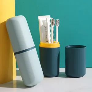 Portable travel toothbrush storage case and wash cup set in minimalist teal and yellow colors