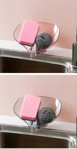 Organizador de fregadero con forma de hoja rosa y gris con ventosa para esponjas.