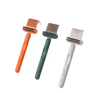 Three-piece ergonomic hair brush cleaning tool set in vibrant orange, green and gray