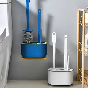 Wall-mounted and floor-standing toilet brush sets for bathroom cleaning.