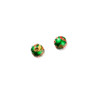 Close-up of 6mm green enamel S925 sterling silver beads for DIY jewelry making