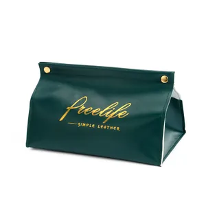 Modern dark green leather tissue box holder with gold lettering and snap buttons
