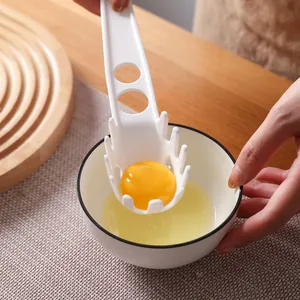 Louche à nouilles multifonctionnelle et séparateur d'œufs en plastique blanc durable