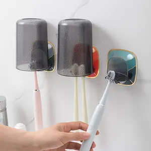Modern wall-mounted toothbrush holder with grey cups, punch-free bathroom storage organizer
