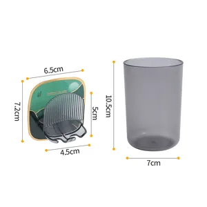 Modern wall-mounted toothbrush cup holder with a grey translucent mouthwash cup for bathroom