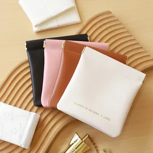 Mini PU leather storage pouches with metal spring closures in black, pink and white