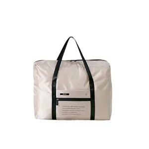 Large foldable polyester travel duffel bag with suitcase trolley sleeve and handles