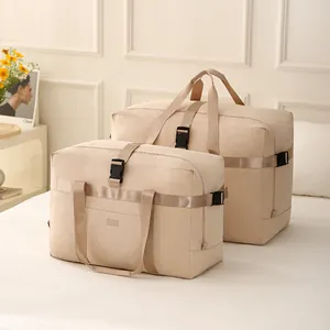 Two-piece beige large capacity foldable travel duffel bag set for women and sports