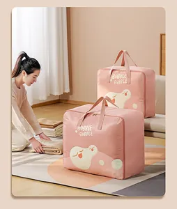 Woman packing bedding into pink cartoon Oxford storage bags in a cozy room