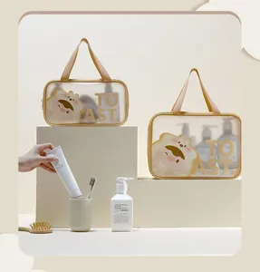 Two cute toast-themed toiletry bags shown with various bathroom accessories for scale