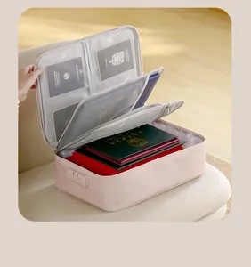 Detailed internal view of pink multi-layer document organizer bag with mesh storage pockets