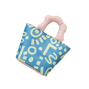 Niedliche wasserfeste Lunchtasche mit blauem Muster und rosa Griff