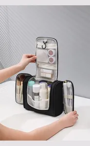 Close-up of a large capacity hanging toiletry bag showing compartments and hooks