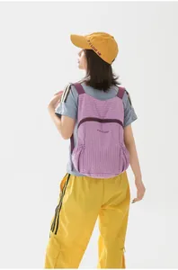 Lightweight purple foldable outdoor backpack for women shown on model
