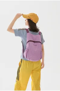 Outdoor foldable ultra-light travel backpack for women shown in purple plaid