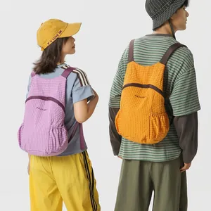 Lightweight foldable outdoor backpack for travel and cycling with water-repellent fabric
