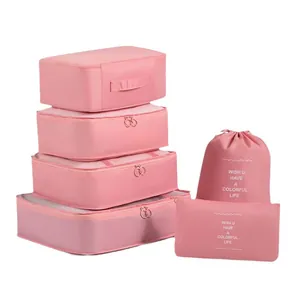 Set of 6 pink travel packing cubes and bags for organized luggage storage and clothes packing