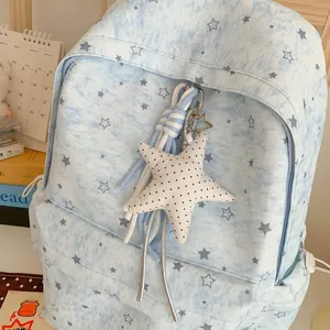 Korean ins style blue backpack with star pattern and plush star keychain detail