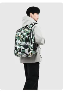 Rear view of a man wearing a green camouflage oxford cloth backpack with a diamond logo