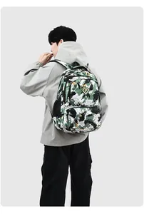 Large capacity camouflage waterproof backpack shown on a male model from behind