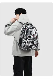 Rear view of a model wearing a camouflage waterproof Oxford cloth laptop backpack