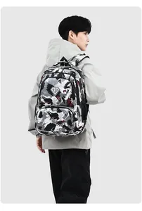 Male model wearing a large capacity camouflage oxford backpack for travel