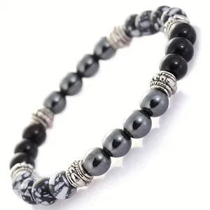 Detailed macro view of a natural stone beaded bracelet with hematite and black onyx
