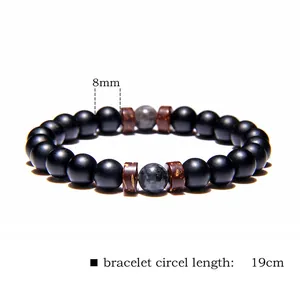 Close-up detail of men's volcanic stone bracelet with 8mm beads and 19cm total length