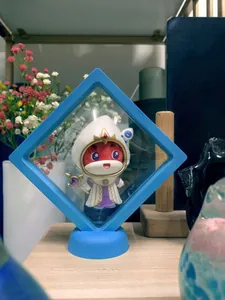 Detail showing a blue PE film suspension jewelry box displaying a collectible doll figurine