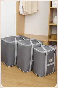 Set mit drei grauen Oxford-Stoff-Aufbewahrungstaschen für Bettwäsche und Decken im Schrank