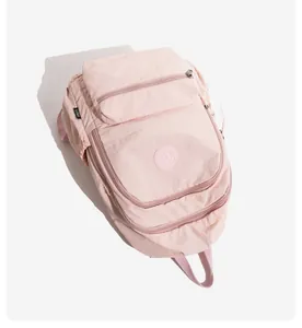Detailed view of lightweight pink casual outdoor backpack with multiple compartments